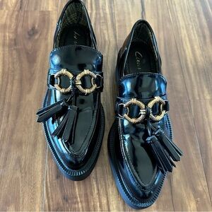 Clarks Women's Black Patent Tassel Loafers with Gold Accent